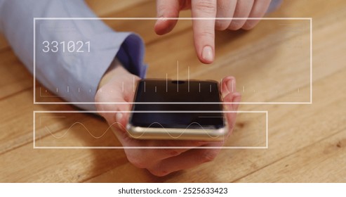Image of financial data processing over caucasian man using smartphone. Global connections, business, finances, computing and data processing concept digitally generated image.