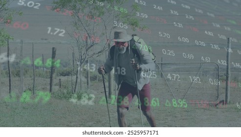 Image of financial data processing over african american man walking in nature. Global business, networks, connections, computing and data processing concept digitally generated image.