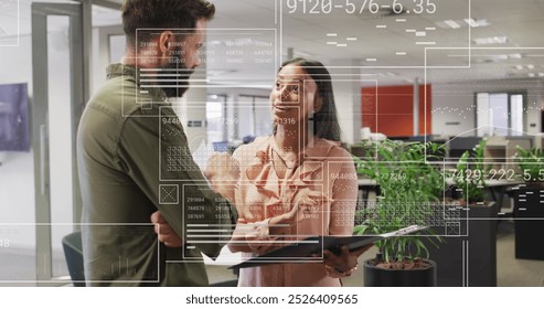 Image of financial data processing over diverse businesspeople in office. Global business, finances, computing and data processing concept digitally generated image.