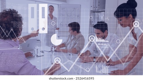 Image of financial data processing over diverse business people in office. Global business, finances, computing and data processing concept digitally generated image.