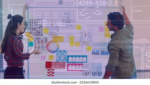 Image of financial data processing over diverse business people working at office. Global business, finances and digital interface concept digitally generated image.