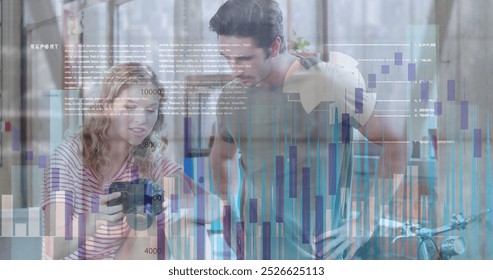 Image of financial data processing over diverse business people in office. Global networks, computing, business, finance and data processing concept digitally generated image.