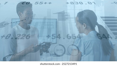 Image of financial data processing over diverse business people. Global business, computing and digital interface concept digitally generated image.