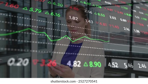 Image of financial data processing over caucasian businesswoman using smartphone. Global finance, business, connections, computing and data processing concept digitally generated image.