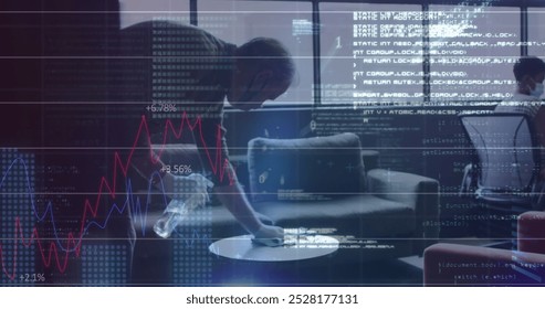 Image of financial data processing over man in face mask disinfecting table. Global covid 19 pandemic, business, finance, technology and data processing concept digitally generated image. - Powered by Shutterstock