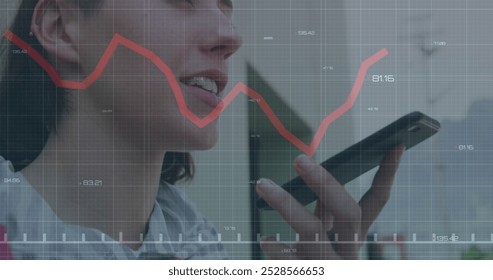 Image of financial data processing over caucasian woman using smartphone. Global computing, digital interface and data processing concept digitally generated image.