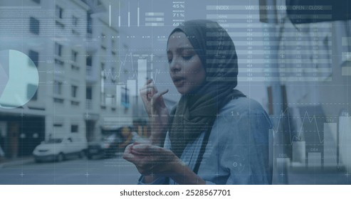 Image of financial data processing over biracial woman. Global computing, digital interface and data processing concept digitally generated image. - Powered by Shutterstock