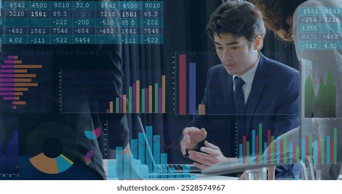 Image of financial data processing over diverse business people in office. Global finance, business, connections, computing and data processing concept digitally generated image.
