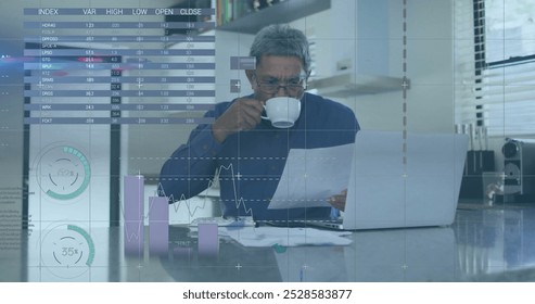 Image of financial data processing over senior asian man using laptop. Global finance, business, connections, computing and data processing concept digitally generated image.