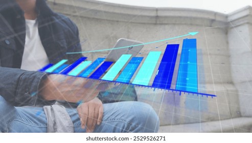Image of financial data processing over biracial man using smartphone. Global finance, business, connections, computing and data processing concept digitally generated image.