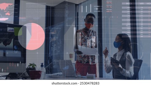 Image of financial data processing over diverse business people wearing face masks. Global business, finances and digital interface during covid 19 pandemic concept digitally generated image. - Powered by Shutterstock