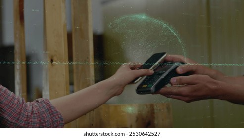 Image of financial data processing over people using smartphone and payment terminal. Global business and data processing concept digitally generated image.