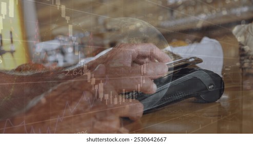 Image of financial data processing over people using smartphone and payment terminal. Global business and data processing concept digitally generated image. - Powered by Shutterstock