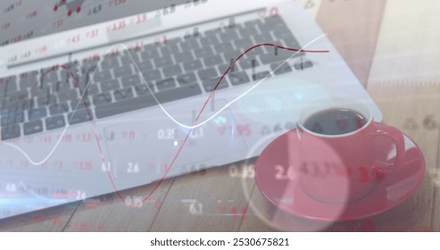 Image of financial data processing over laptop. Global computing, business, finance and data processing concept digitally generated image.