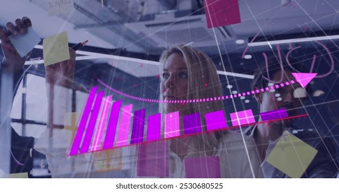Image of financial data processing over caucasian businsswoman in office. Global business, finances, computing and data processing concept digitally generated image.