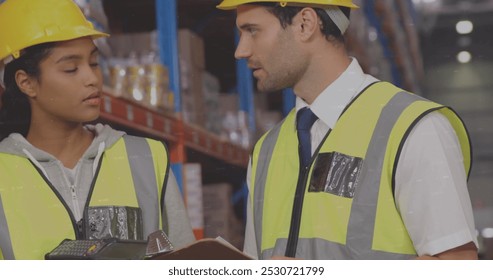 Image of financial data processing over two diverse warehouse worker. global shipping, delivery, business, data processing and technology concept digitally generated image. - Powered by Shutterstock