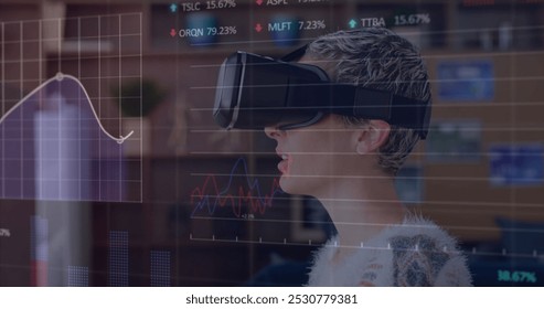 Image of financial data processing over woman wearing vr headset. Global connections, business, finance, computing and data processing concept digitally generated image. - Powered by Shutterstock