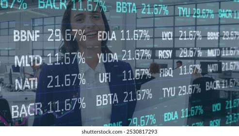 Image of financial data processing over businesswoman. global business, finances and data processing concept digitally generated image. - Powered by Shutterstock