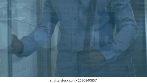 Image of financial data processing over african american businessman. Global business and data processing concept digitally generated image.