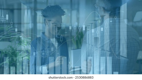 Image of financial data processing over diverse business people in office. Global business and digital interface concept digitally generated image. - Powered by Shutterstock