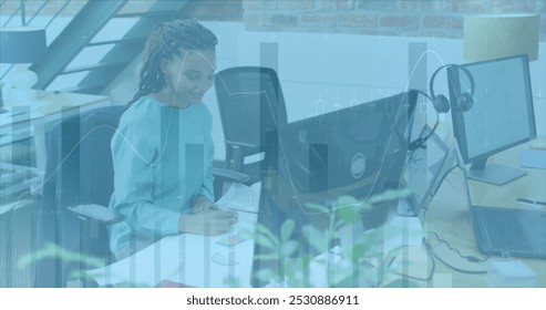 Image of financial data processing over business people working in office. Global business data processing digital interface technology concept digitally generated image.