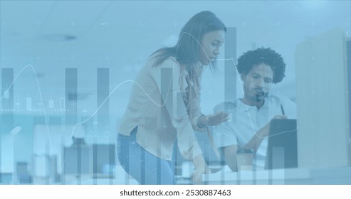 Image of financial data processing over diverse business people in office. Global business and digital interface concept digitally generated image.