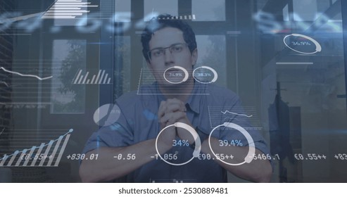 Image of financial data processing over businessman in office. global business, finances, connections and digital interface concept digitally generated image.