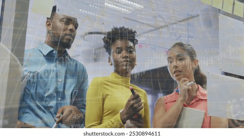 Image of financial data processing over diverse business people having meeting at office. Global business, finances and digital interface concept digitally generated image.