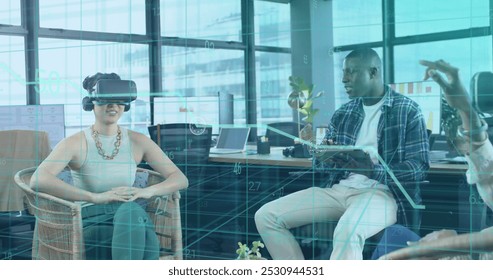 Image of financial data processing over diverse businesspeople in office. Global business, finance, computing and data processing concept digitally generated image.