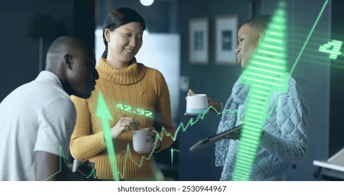 Image of financial data processing over diverse businesspeople working in office. Global business, finance, computing and data processing concept digitally generated image.