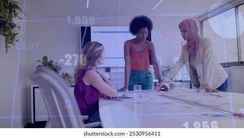 Image of financial data processing over diverse business people in office. Global business, finance, computing and data processing concept digitally generated image.