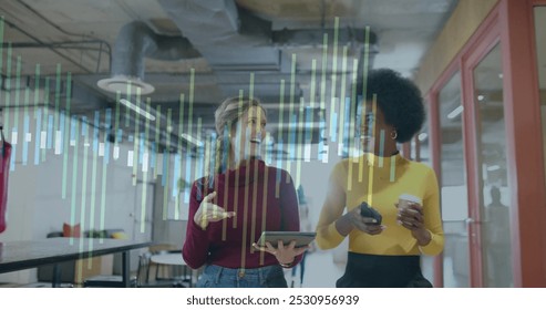 Image of financial data processing over diverse business people in office. Global business, finance, computing and data processing concept digitally generated image.