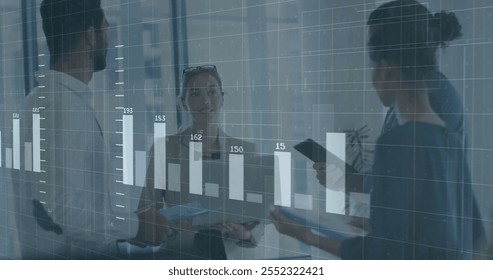 Image of financial data processing over diverse business people in office. Global finance, business, connections, computing and data processing concept digitally generated image.
