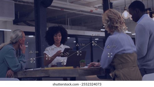 Image of financial data processing over diverse business people working together. Global finance, business, connections, computing and data processing concept digitally generated image.