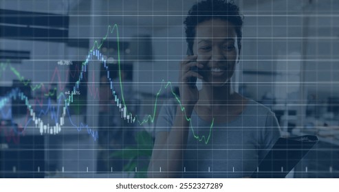 Image of financial data processing over biracial businesswoman using smartphone. Global finance, business, connections, computing and data processing concept digitally generated image. - Powered by Shutterstock