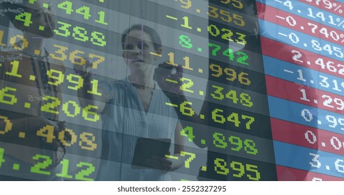 Image of financial data processing over diverse business people in office. Global finance, business, connections, computing and data processing concept digitally generated image.