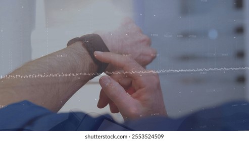 Image of financial data processing over caucasian man using smartwatch. Global finance, business, connections, computing and data processing concept digitally generated image. - Powered by Shutterstock