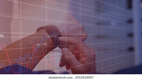 Image of financial data processing over caucasian man using smartwatch. Global finance, business, connections, computing and data processing concept digitally generated image. - Powered by Shutterstock