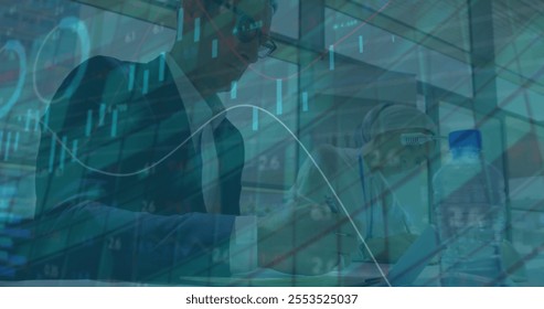 Image of financial data processing over diverse colleagues working in office. Global business, finances and digital interface concept digitally generated image.