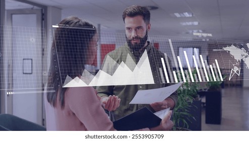 Image of financial data processing over diverse colleagues discussing work in office. Global business, finances and digital interface concept digitally generated image. - Powered by Shutterstock