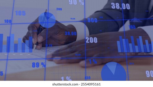 Image of financial data processing over african american businessman writing. Global finance, business, connections, computing and data processing concept digitally generated image. - Powered by Shutterstock