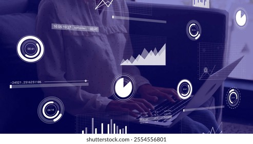 Image of financial data processing over biracial businesswoman using laptop in office. Global finance, business, connections, computing and data processing concept digitally generated image. - Powered by Shutterstock