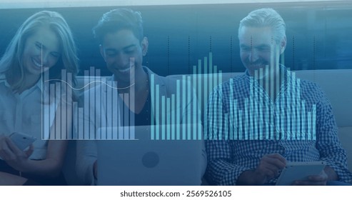 Image of financial data processing over diverse business people using laptop in office. Global finance, business, connections, computing and data processing concept digitally generated image.
