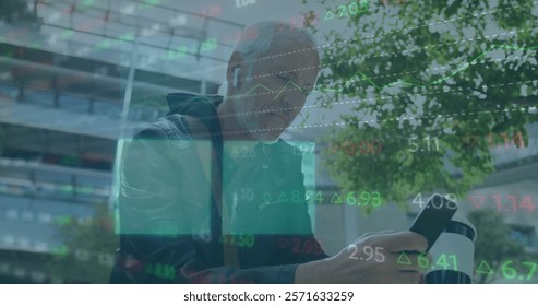 Image of financial data processing over caucasian man using smartphone. Global business, finances, computing and data processing concept digitally generated image.