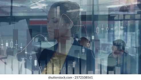 Image of financial data processing over diverse business people in office. Global finance, business, connections, computing and data processing concept digitally generated image.