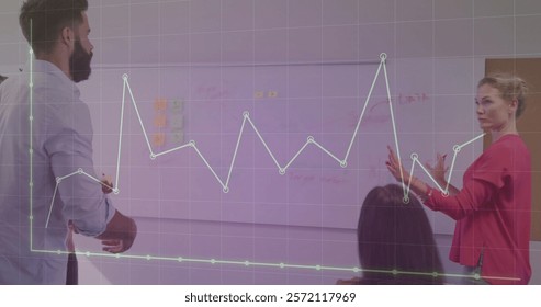 Image of financial data processing over diverse colleagues having meeting in office. Global business, computing, communication and digital interface concept digitally generated image.