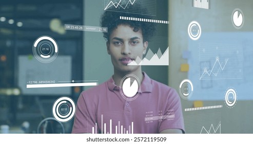 Image of financial data processing over biracial businessman in office. Global finance, business, connections, computing and data processing concept digitally generated image.