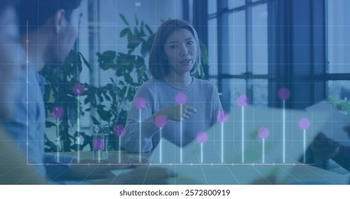 Image of financial data processing over diverse business people in office. Global finance, business, connections, computing and data processing concept digitally generated image.