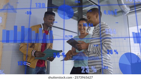 Image of financial data processing over diverse business people in office. Global finance, business, connections, computing and data processing concept digitally generated image.