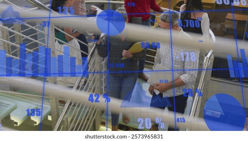 Image of financial data processing over diverse business people in office. Global finance, business, connections, computing and data processing concept digitally generated image.